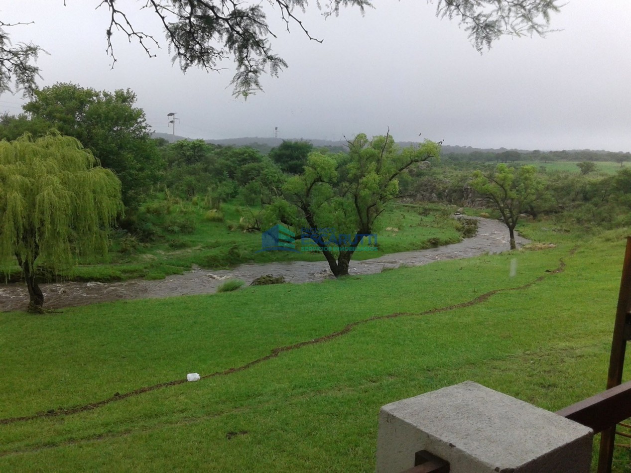 EXCELENTE CAMPO de 54 HAS. S/ COSTA DE ARROYO C/ TRES CABAÑAS A 20 MINUTOS DE ALMAFUERTE. 